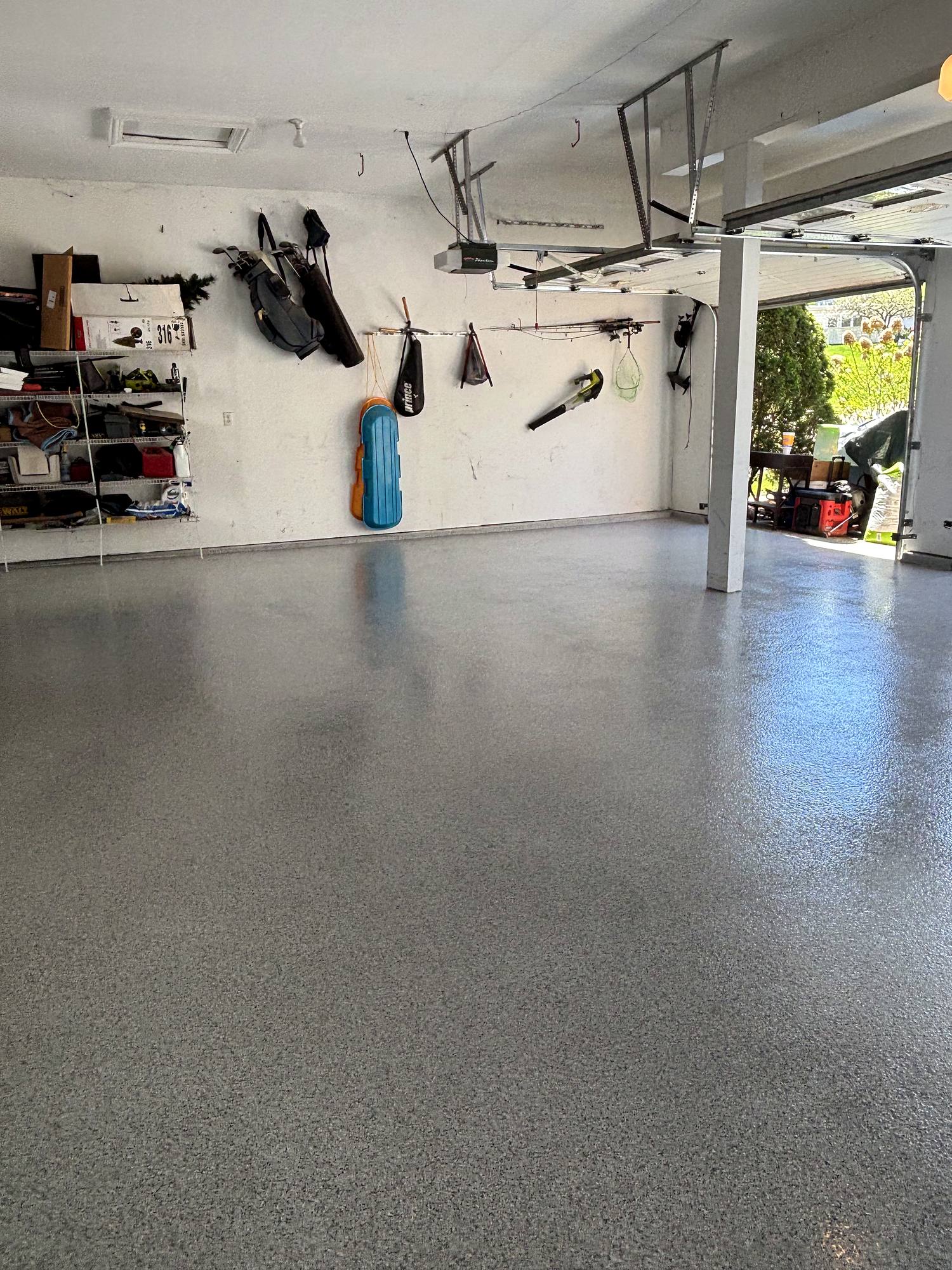 Same garage after crack repair and flake epoxy floor coating
